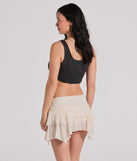 With its midriff cut and trend-forward fit, the Rebel Style Graphic Cropped Tank Top is a black crop top made to pair with skirts, denim, or whatever vibe you're feeling this season.