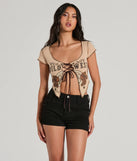 The Wild West Showdown Lace-Up Graphic Crop Top in tan with a modern design and trendy look is part of the latest women's tops collection to elevate your 2025 wardrobe.