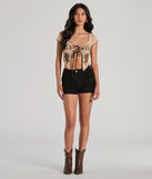 
Upgrade your style game for 2025 with the Wild West Showdown Lace-Up Graphic Crop Top in tan, perfect for any fashion-forward wardrobe.