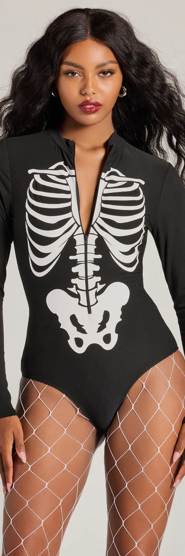 The Glam Ghoul Skeleton Print Bodysuit is a women's black long-sleeve top with an elevated style and unique design accents, perfect for layering or transitioning into colder months.