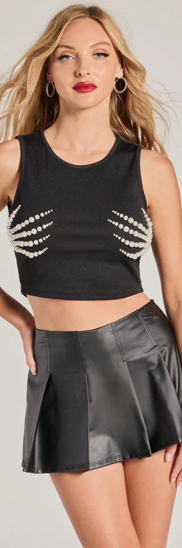 Trendy women’s tops, like the Spooky Chic Pearl Skeleton Hands Cropped Tank Top, bring effortless style for fall layering, lounging, or going out.