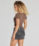 With its midriff cut and trend-forward fit, the Girl Next Door Ribbed Knit Henley Crop Top is a brown crop top made to pair with skirts, denim, or whatever vibe you're feeling this season.
