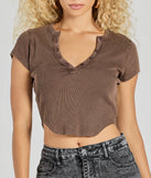 Upgrade your style game for 2025 with the Girl Next Door Ribbed Knit Henley Crop Top in brown, perfect for any fashion-forward wardrobe.