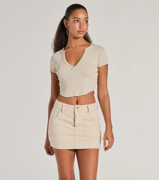 The Girl Next Door Ribbed Knit Henley Crop Top in ivory with a modern design and trendy look is part of the latest women's tops collection to elevate your 2025 wardrobe.