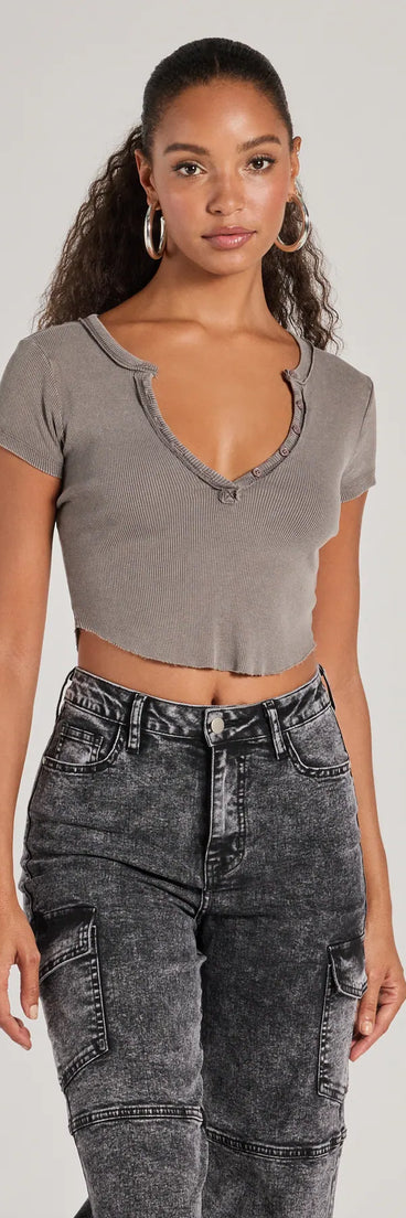 The Girl Next Door Ribbed Knit Henley Crop Top in gray with a modern design and trendy look is part of the latest women's tops collection to elevate your 2025 wardrobe.
