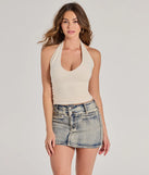 The Trendy Find Knit Halter Top in ivory with a modern design and trendy look is part of the latest women's tops collection to elevate your 2025 wardrobe.
