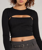 The Snuggle Worthy Ribbed Knit Long Sleeve Top is a women's black long-sleeve top with an elevated style and unique design accents, perfect for layering or transitioning into colder months.