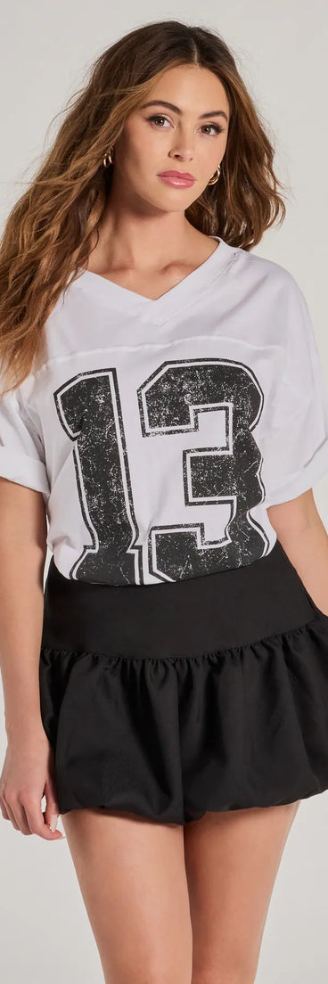 The Sporty Style Oversized Graphic Tee in white with a modern design and trendy look is part of the latest women's tops collection to elevate your 2025 wardrobe.