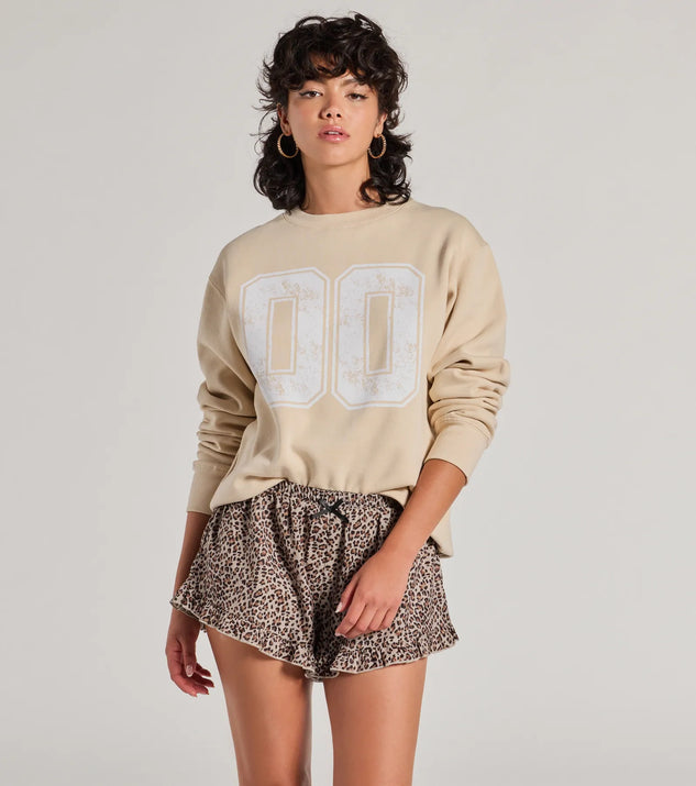 The Sporty Era Oversized Fleece Screen Sweatshirt in tan with a modern design and trendy look is part of the latest women's tops collection to elevate your 2025 wardrobe.