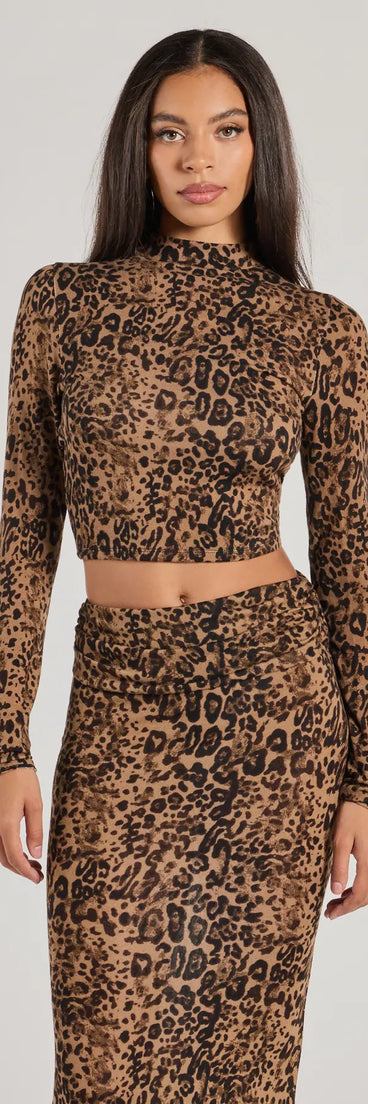 Effortlessly create party outfits or vacation-ready looks with the Bold Aura Leopard Print Knit Crop Top, one part of a versatile women's leopard print matching set perfect for quick and easy outfit combinations from layering chic outfits to transitioning your look seamlessly.
