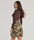 Add a sleek touch to your outfit with this brown long sleeve top—the Essential Long Sleeve Crew Top makes effortless transitions from desk to dinner.