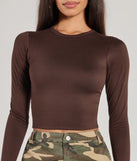 The Essential Long Sleeve Crew Top is a women's brown long-sleeve top with an elevated style and unique design accents, perfect for layering or transitioning into colder months.