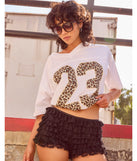 The 23 Leopard Print Oversized Graphic Tee in white with a modern design and trendy look is part of the latest women's tops collection to elevate your 2025 wardrobe.