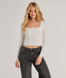 The Back To Basics Cropped Long Sleeve Top in ivory with a modern design and trendy look is part of the latest women's tops collection to elevate your 2025 wardrobe.