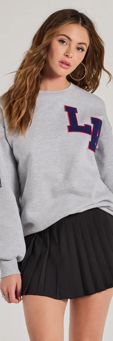 The LA Graphic Fleece Sweatshirt in gray with a modern design and trendy look is part of the latest women's tops collection to elevate your 2025 wardrobe.