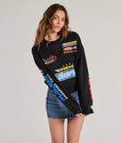 The Trendy Moto Graphic Fleece Pullover Sweatshirt in black with a modern design and trendy look is part of the latest women's tops collection to elevate your 2025 wardrobe.