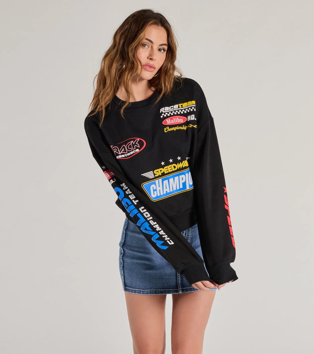 The Trendy Moto Graphic Fleece Pullover Sweatshirt in black with a modern design and trendy look is part of the latest women's tops collection to elevate your 2025 wardrobe.