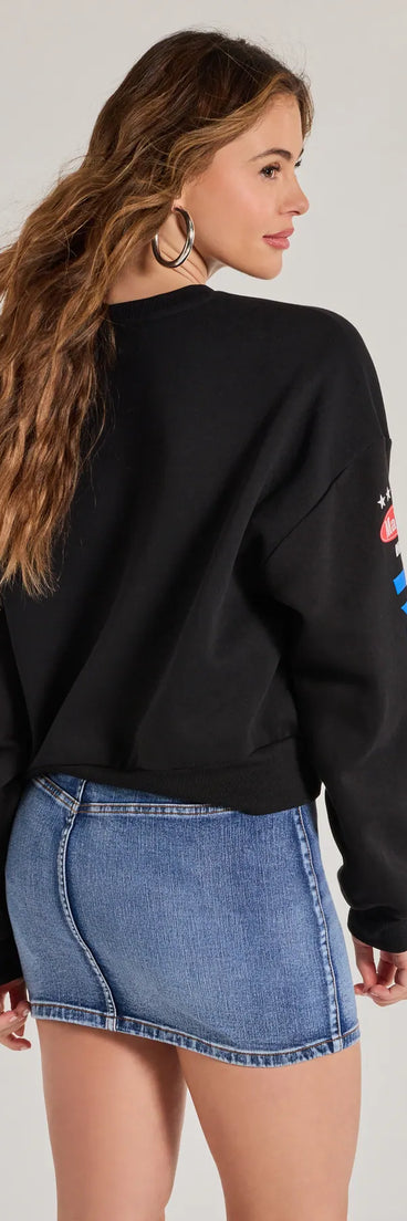 Layer-friendly Trendy Moto Graphic Fleece Pullover Sweatshirt is a chic, transitional black long-sleeve top with contemporary sleeves and neckline design, ideal for an elevated seasonal style or casual elegance.