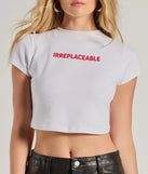 The Irreplaceable Cropped Graphic Tee in white with a modern design and trendy look is part of the latest women's tops collection to elevate your 2025 wardrobe.