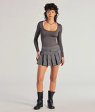 Flaunt your silhouette with the Sleek Appeal Ribbed Knit Long Sleeve Bodysuit, a chic charcoal bodysuit crafted for sleek looks. Whether you're dressing up for parties or just want to stop their scroll, this fitted design adds modern flair to any outfit.