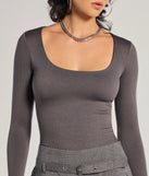 Elevate your seasonal style with the Sleek Appeal Ribbed Knit Long Sleeve Bodysuit, a charcoal bodysuit designed for confident and effortless styling with anything from mini skirts to high-waist jeans.