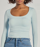 The Forever Staple Smooth Knit Long Sleeve Top is a women's light blue long-sleeve top with an elevated style and unique design accents, perfect for layering or transitioning into colder months.