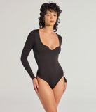 Elevate your seasonal style with the Luxe Be A Lady Faux Pearl Bodysuit, a black bodysuit designed for confident and effortless styling with anything from mini skirts to high-waist jeans.