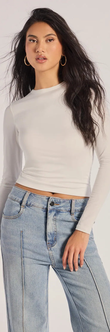 The Fave Staple Knit Crew Neck Long Sleeve Top in white with a modern design and trendy look is part of the latest women's tops collection to elevate your 2025 wardrobe.