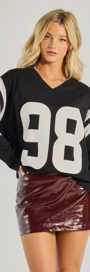 The 98 Oversized Long Sleeve Tunic in black with a modern design and trendy look is part of the latest women's tops collection to elevate your 2025 wardrobe.