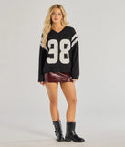 The 98 Oversized Long Sleeve Tunic in black with a modern design and trendy look is part of the latest women's tops collection to elevate your 2025 wardrobe.