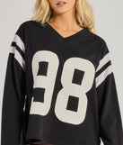 The 98 Oversized Long Sleeve Tunic in black with a modern design and trendy look is part of the latest women's tops collection to elevate your 2025 wardrobe.