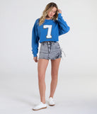 From bold to effortless, the Sporty And Flirty Seven Graphic Crop Sweatshirt lets you define your vibe with blue tops that speak your style.