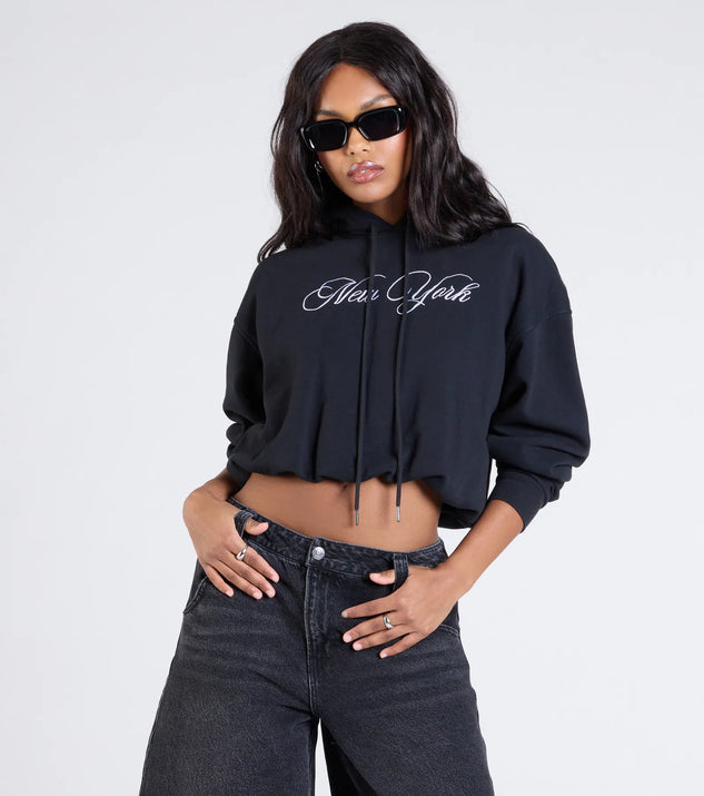 The New York Bubble Crop Hoodie in black brings edge and energy to your vibe, ready to elevate any festival look or concert outfit.