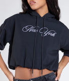 The New York Bubble Crop Hoodie in black brings edge and energy to your vibe, ready to elevate any festival look or concert outfit.