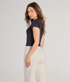 With its midriff cut and trend-forward fit, the No Hard Feelings Graphic Tee is a navy blue crop top made to pair with skirts, denim, or whatever vibe you're feeling this season.
