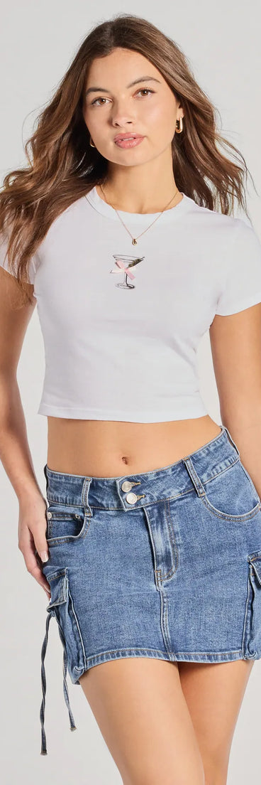 With its midriff cut and trend-forward fit, the Social Girl Martini Bow Crop Graphic Tee is a white crop top made to pair with skirts, denim, or whatever vibe you're feeling this season.