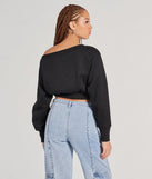With its midriff cut and trend-forward fit, the Cutie Alert Long Sleeve Fleece Crop Sweatshirt is a black crop top made to pair with skirts, denim, or whatever vibe you're feeling this season.
