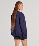 The Los Angeles Embroidered Oversized Sweatshirt in navy blue with a modern design and trendy look is part of the latest women's tops collection to elevate your 2025 wardrobe.
