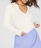 Stay on-trend this season with the Cute Guarantee Long Sleeve Henley Crop Top in off-white, a must-have for creating stylish and effortless spring outfits for women.