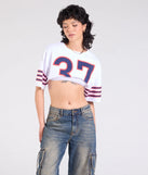 The Go Team Varsity Graphic Crop Tee in white brings edge and energy to your vibe, ready to elevate any festival look or concert outfit.