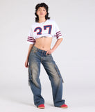 With its midriff cut and trend-forward fit, the Go Team Varsity Graphic Crop Tee is a white crop top made to pair with skirts, denim, or whatever vibe you're feeling this season.