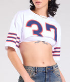 From bold to effortless, the Go Team Varsity Graphic Crop Tee lets you define your vibe with white tops that speak your style.