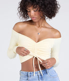 Stay on-trend this season with the Sultry Perception Off-The-Shoulder Crop Top in banana yellow, a must-have for creating stylish and effortless summer outfits for women.