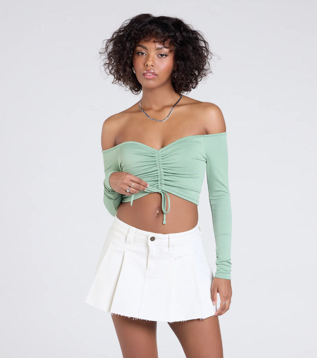 Stay on-trend this season with the Sultry Perception Off-The-Shoulder Crop Top in sage green, a must-have for creating stylish and effortless spring outfits for women.
