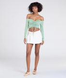 The Sultry Perception Off-The-Shoulder Crop Top in sage green brings edge and energy to your vibe, ready to elevate any festival look or concert outfit.
