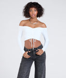 Stay on-trend this season with the Sultry Perception Off-The-Shoulder Crop Top in white, a must-have for creating stylish and effortless spring outfits for women.