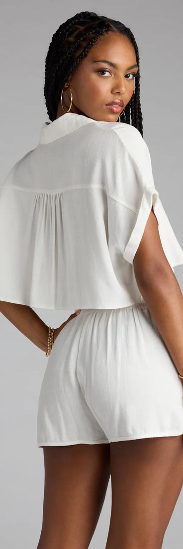 Perfect for layering or wearing solo, this short sleeve top features the Casual Plans Button-Down Linen Top in off-white for effortless everyday styling with jeans, cargos, or skirts.