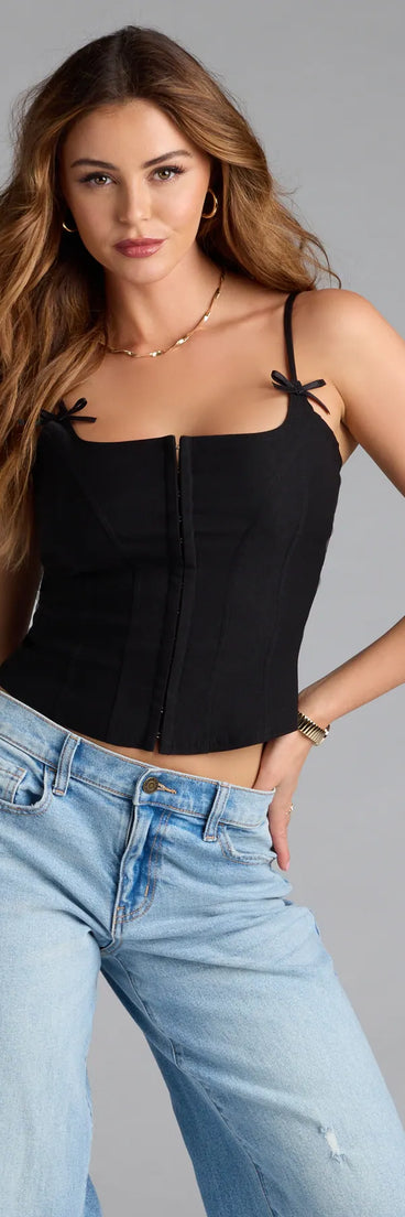 Complete your look with the Sculpted Cutie Bow Corset Top, a trendy black top that’s ready to pair with anything in your fall rotation.