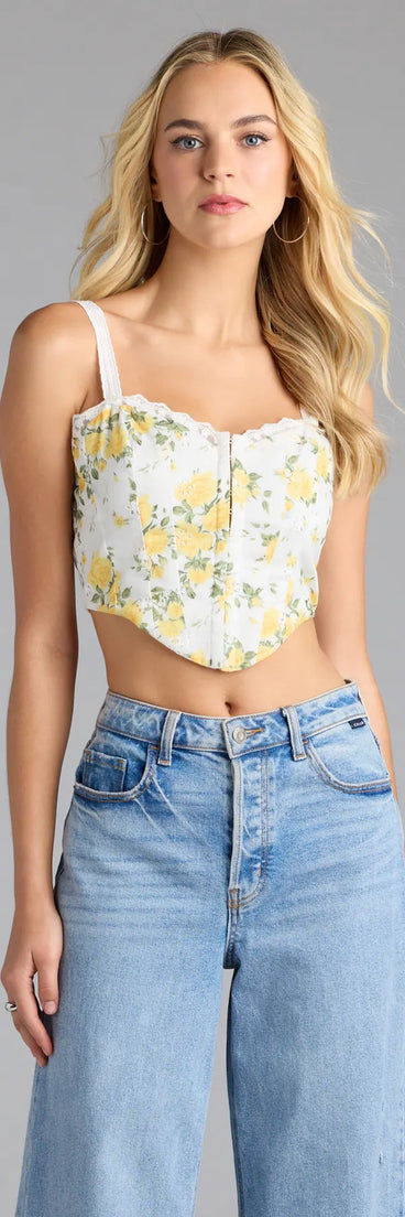 Complete your look with the Off The Vine Lace Trim Rose Print Bustier, a trendy ivory top that’s ready to pair with anything in your fall rotation.