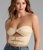 With its midriff cut and trend-forward fit, the Buckle Up Strapless Cutout Crop Top is a beige crop top made to pair with skirts, denim, or whatever vibe you're feeling this season.